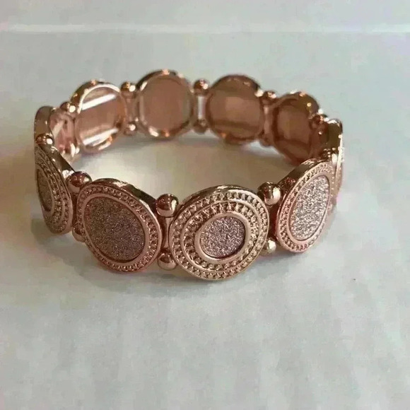 Macy’s new copper colored faux diamond bracelet - Picture 8 of 8